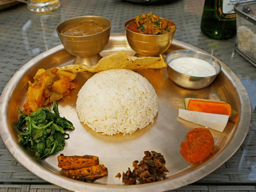 Authentic Nepali Evening: Traditional Food and Cultural Show - The main feast: dal bhat and momo, done the right way