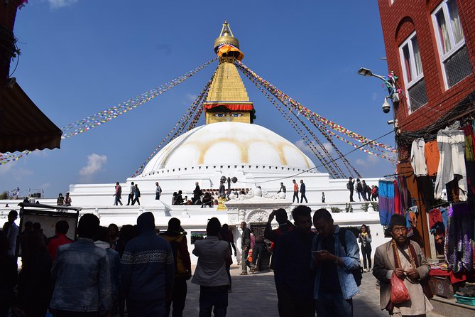 Half Day Boudhanath Stupa Tour in Kathmandu - Monasteries, devotees, and the surrounding Tibetan community